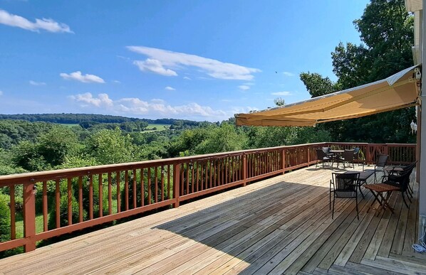 The remote controlled awning on the deck provides shade 