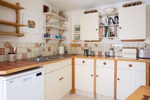 With an oven, gas hob and lots of utensils, you can enjoy preparing meals at the cottage if you choose not to head out.