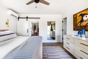 The bedroom features a dresser to put your things away and get cozy