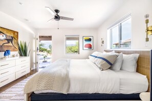 Plush king-sized bed in the bedroom & a separate entrance to the room