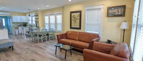 Open concept living room, dining and kitchen area