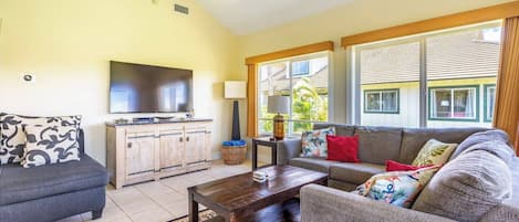 spacious and bright living room.  high ceilings