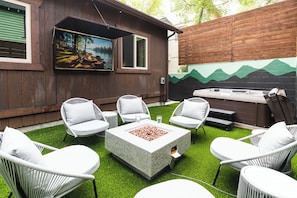 Enjoy the firepit or relax in the hot tub while watching a show.