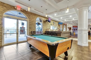 Challenge friends to a game of pool in the resort's entertainment haven