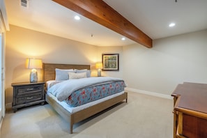 King sized bed and smart tv in master bedroom. 