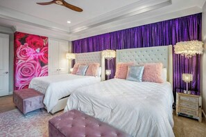 Glam / Bachelorette Bedroom - This bedroom sleeps 5 people, Four in the 2 Queen size beds and 1 person on the pull out pink velvet futon sofa.  Rose wall with neon sign "Hello Gorgeous" perfect for a group shot or selfies. 