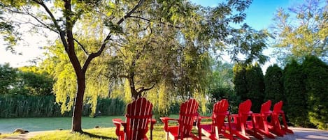Our backyard oasis sits on Cedar Creek and Cedar Creek Conservation area. Enjoy the evenings on the patio, or mornings with your coffee.
