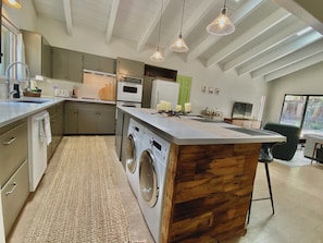 Large kitchen island with Washer and Dryer 
