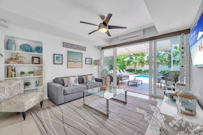 Enjoy your time overlooking the heated pool, watching your favorite show on the smart TV. This room also features a queen pull out sofa.