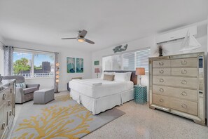 The second bedroom is a spacious king room, adorned with a plush bed and a smart TV for your ultimate relaxation.