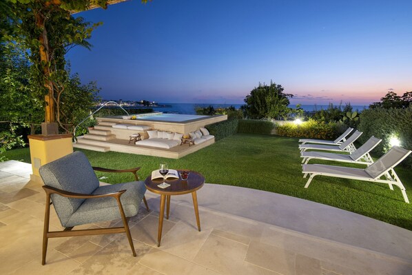 Infinity pool with sunset