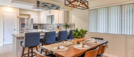 The open concept of the newly renovated kitchen and dining space allows you to cook and enjoy meals together.