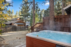 Imagine yourself here, stargazing while soaking your cares away.