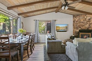Open concept living and dining area.  Dining seating for up to eight people.