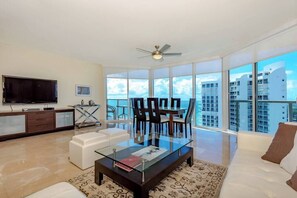 Corner unit with floor to ceiling windows cover the entire living. Amazing ocean views, intracoastal views, and downtown Miami skyline.