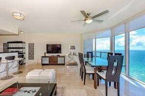 Corner unit with floor to ceiling windows cover the entire living. Amazing ocean views, intracoastal views, and downtown Miami skyline.