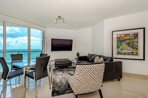 Modern decor throughout with amazing ocean views! Spacious layout with oceanfront dining :)