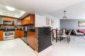 Modern kitchen equipped with state-of-the-art appliances and ample counter space.