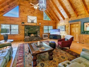 Main Level Living Room with Gas Log Fireplace & Flat Screen TV