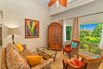 Refreshed End unit with Island Decor at Puamana 24A
