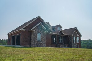 The house sits on Far Niente Farms an active beef cattle operation.