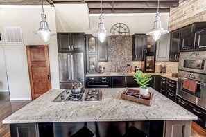 Kitchen with entry to 1/2 bath on ground floor