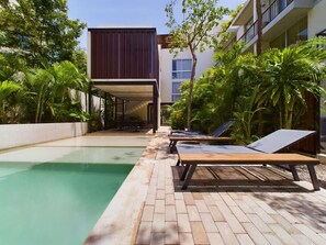 Enjoy the shared pool and sundecks in the beautiful common area.