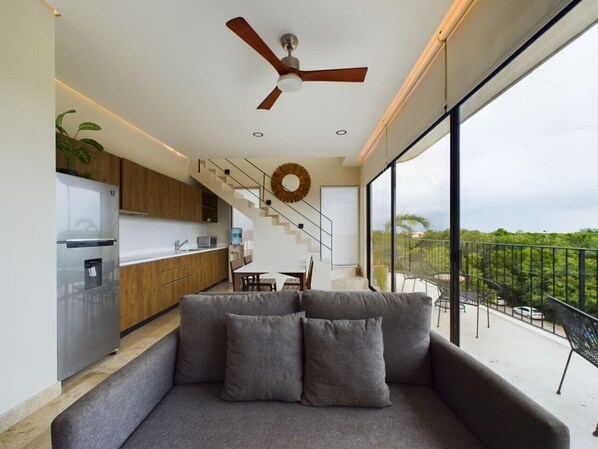 Relax in style with comfy seating and sky views.
