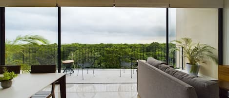 Step out onto the terrace from the living room for a stunning view of Tulum.