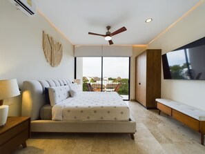 King suite with Smart TV, classic bed & private balcony.