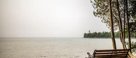 Enjoy picturesque views of the Cana Island Lighthouse from your private beach!