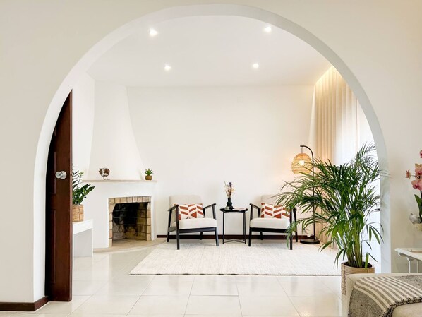 The spacious living room features a sofa-bed and is filled with natural light, creating a warm and welcoming atmosphere #spacious #atmosphere #portugal #algarve #loulé