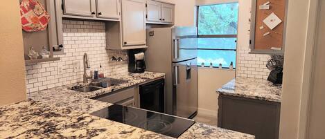 Fully stocked kitchen. 