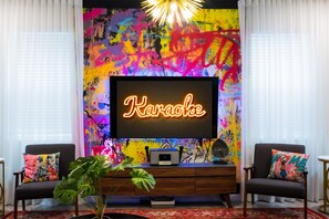 Unleash your inner superstar with our in-house karaoke machine – perfect for unforgettable nights in! 