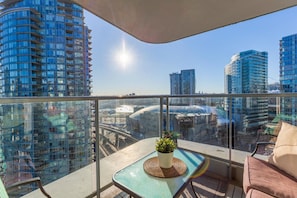 Skyline Serenity: Relax and Take in the City Views from our Balcony Retreat