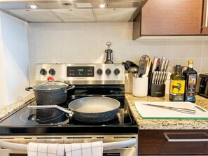 Take a break from eating out and cook a few meals in your fully stocked kitchen. Includes a full knife set, cutting boards, toaster, blender, hot water kettle, pour over coffee station, pots and pans, and baking sheets.