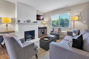 Living room: sofa, two chairs, TV
The fireplace is to not be utilized.