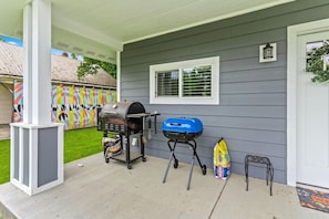 Front porch BBQ area with free charcoal