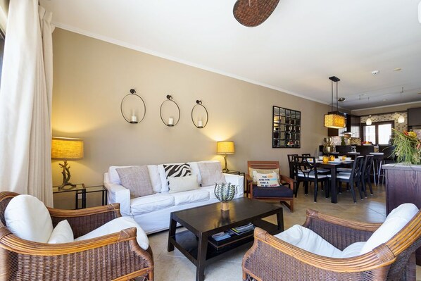 Modern comfort: Relax in style in this chic Airbnb living room.
