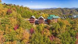 Drone view of the cabin and fall foilage
