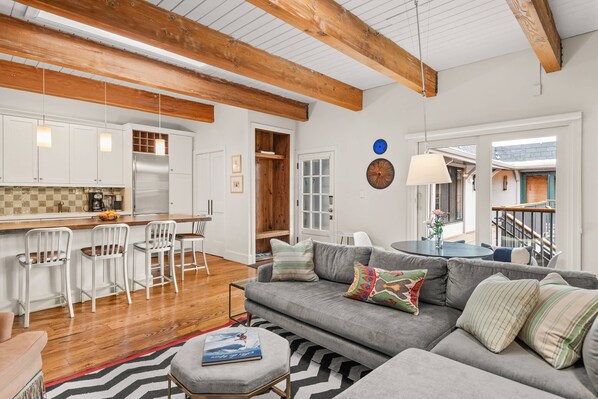 Beautiful wood floors, distinctive artwork and comfortable furnishings create a very welcoming space to unwind.