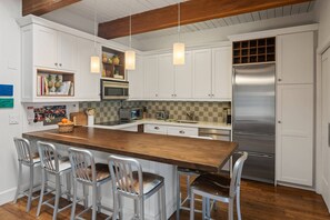 The fully equipped kitchen makes it easy to dine at home.  Dining out is just as easy with restaurants just steps away!