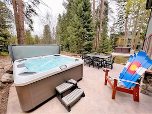 Private hot tub nestled in the pines