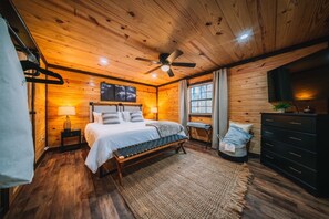 Primary bedroom with king bed and (private) full bathroom