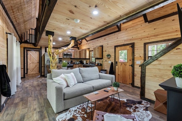 Living room with open kitchen.