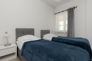A quiet bedroom perfect for relaxing.