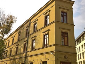 Exterior view of the apartment building showcasing its classic architecture and historic charm.

