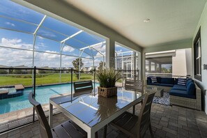 Relax in style on this inviting patio with a private pool and comfortable seating, perfect for enjoying sunny days and starry nights.