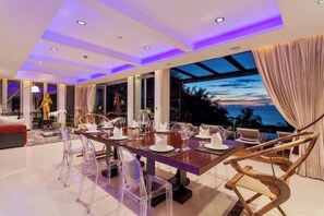 Exquisite dining with magnificent views out to sea. Private chef option.