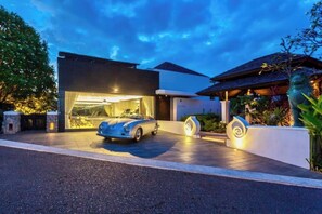 In an exclusive luxury estate, with private parking, billiards & fitness room.